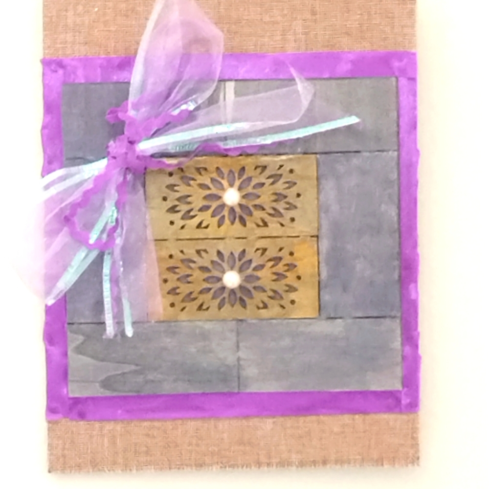 Purple room decor made from burlap material and purple ribbon for wall art